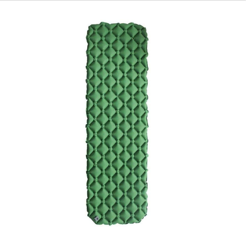 Green inflatable camping mat for outdoor sleeping