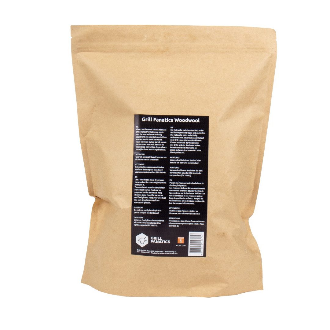 Sealed brown paper bag of wood wool firelighters with detailed product label on back.