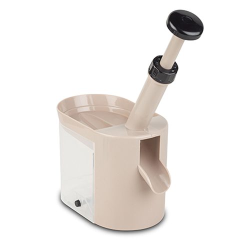 Side view of beige cherry pitter with plunger and container.