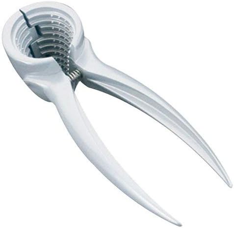 Nut Cracker Tool cracking walnuts with metal arms