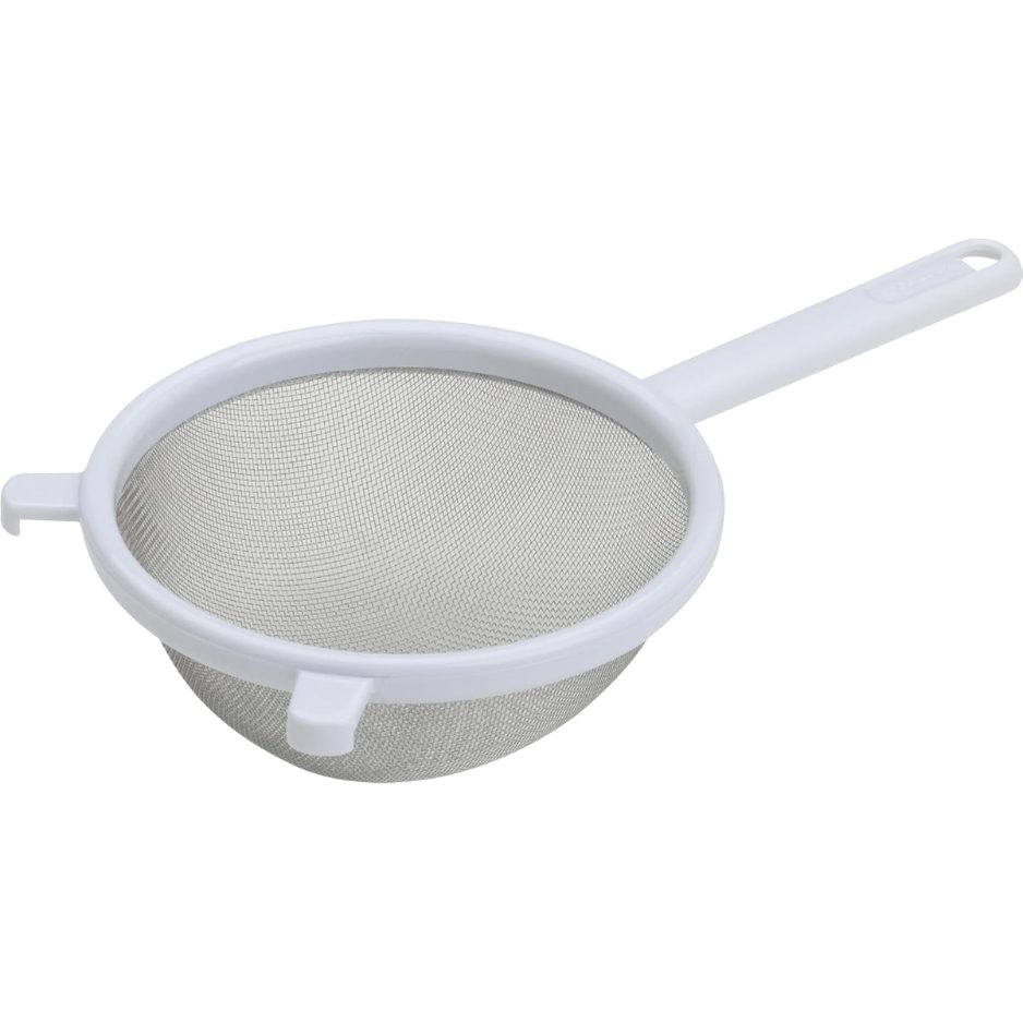 Fine stainless steel strainer filtering tea